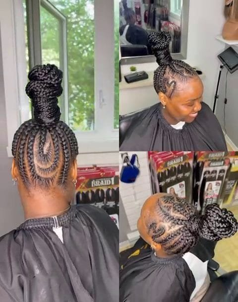 Femme avec des nattes américaines aux motifs complexes et un chignon haut tressé, coiffure protectrice élégante.