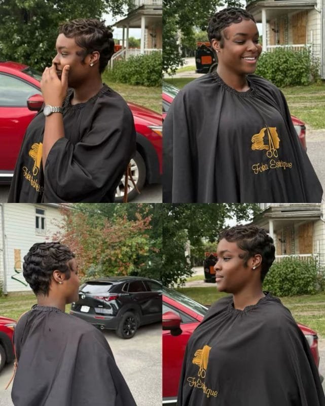 Femme souriante avec une coupe pixie courte noire et élégante aux ondulations Finger Waves