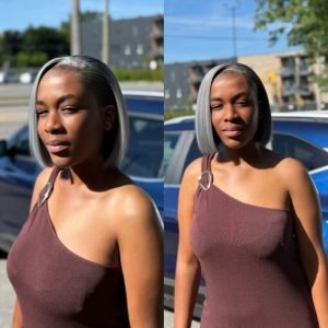 Femme avec perruque bob grise, baby hair et raie au milieu.