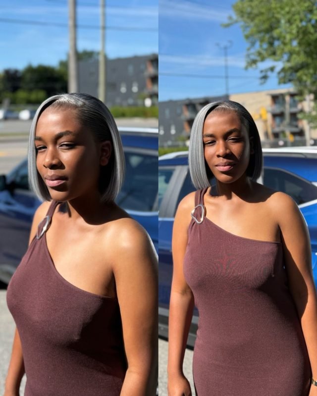 Femme avec perruque bob grise, baby hair et raie au milieu.